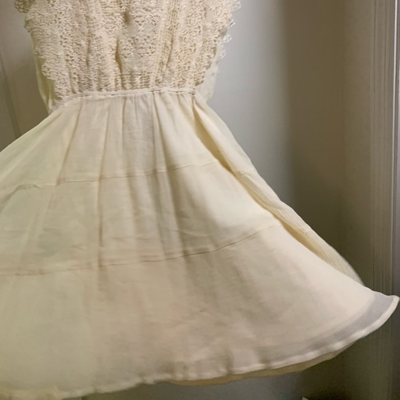 A gorgeous creamy white dress, made by Moon River. - Picture 3 of 4